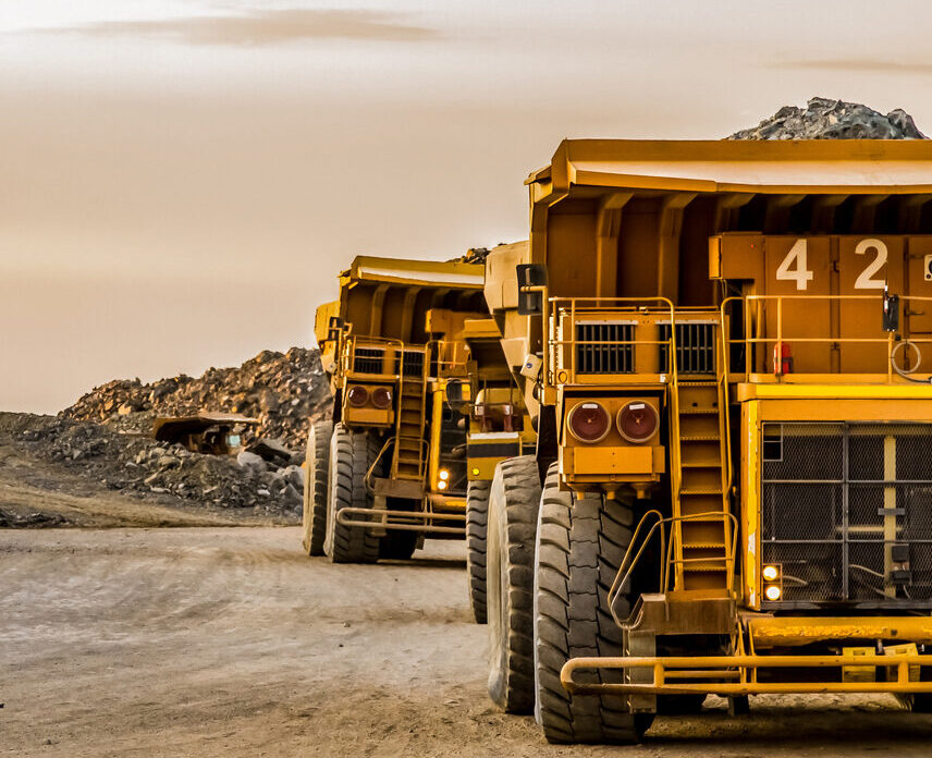 large-mining-rock-dump-trucks-transporting-platinum-ore-for-processing-2